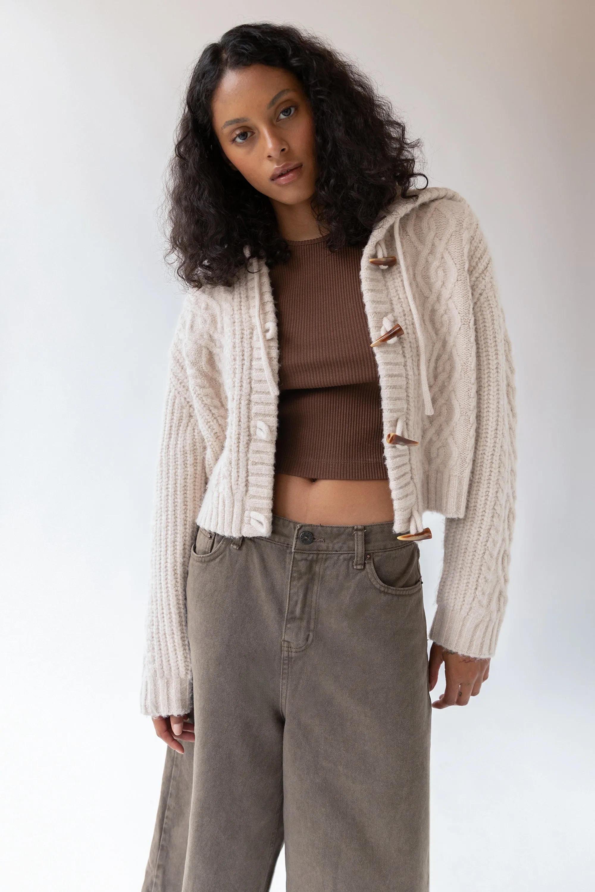 CABLE KNIT HOODED CARDIGAN WITH TOGGLE CLOSURE