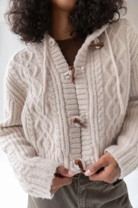 CABLE KNIT HOODED CARDIGAN WITH TOGGLE CLOSURE