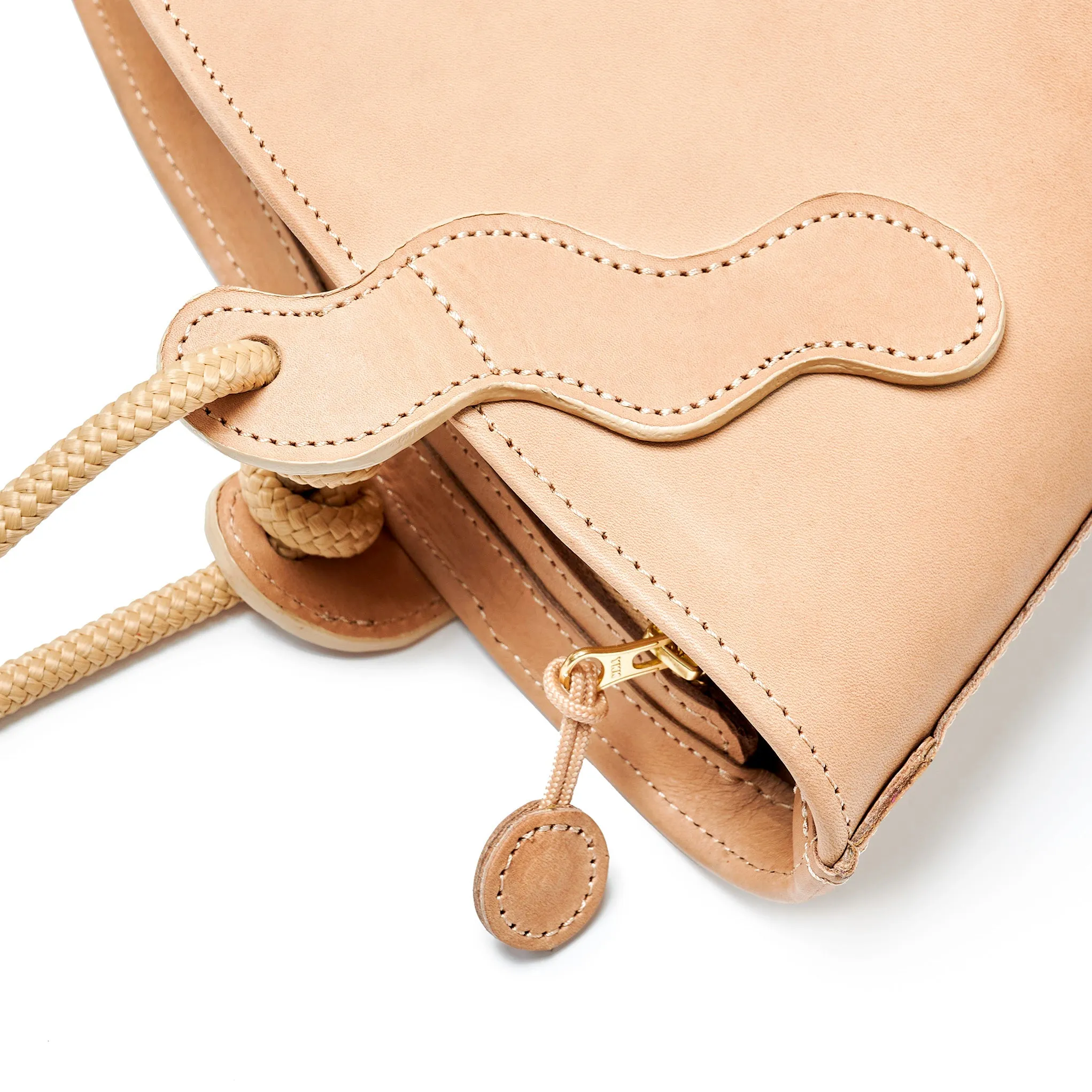 Project Dyad || Almond Color trapeze-shaped cow leather Inner small pocket Rope handle Emele Zipper Bag